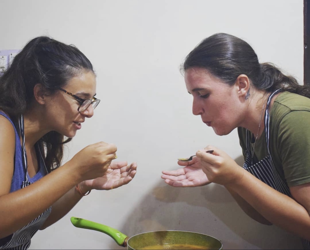Guests mixing dough in steel bowls